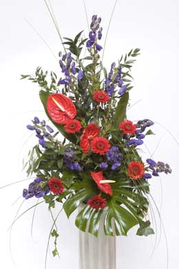 Anthurium, gerbera and aconitum pedistal decoration