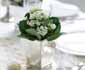 A great idea form the Flowers & Plants Association - kalanchoes in silver pots make a cute place setting that your guests can take home!